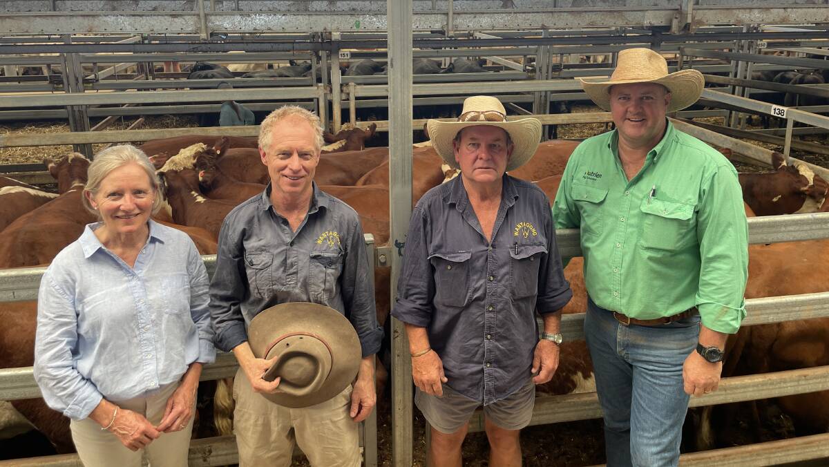 Wantagong principals, Cathy Simpson and Gordon Shaw, Holbrook, with Peter Stead, station manager, and Matt Pitzen, Paull and Scollard Nutrien Holbrook, with a pen of 19 Hereford heifers which sold for $1480. Picture by Stephen Burns.