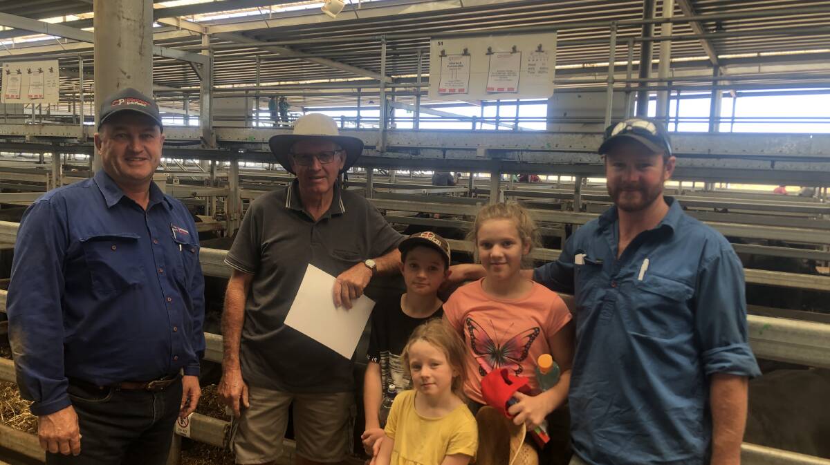 David Meehan, Corcoran Parker, Wodonga with clients Neville, Adrian, Emma, Darcey and Laurie Watkins, Charlock Partnership, Charleroi, Victoria. They sold PTIC Angus heifers to $2940. Photo: NVLX Wodonga