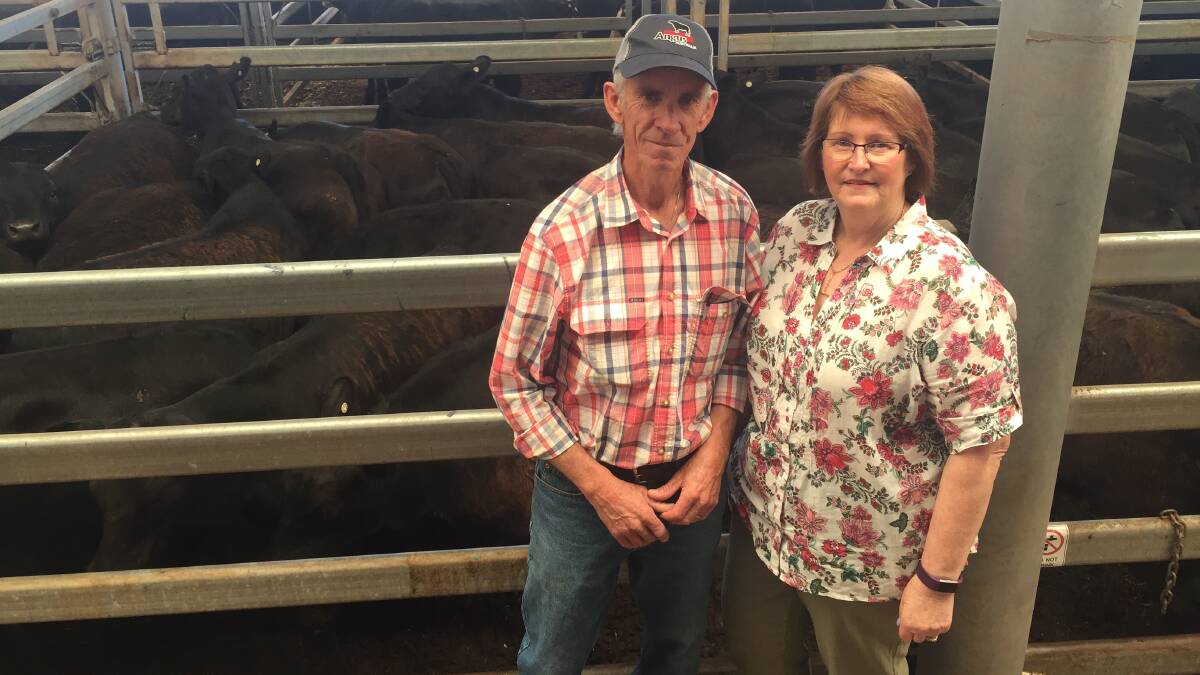 Peter and Helen Kirkbride, Baddaginnie, with their pen of 26 Angus steers weighing 369kg which sold to a repeat buyer for $1150 at Wodonga.
