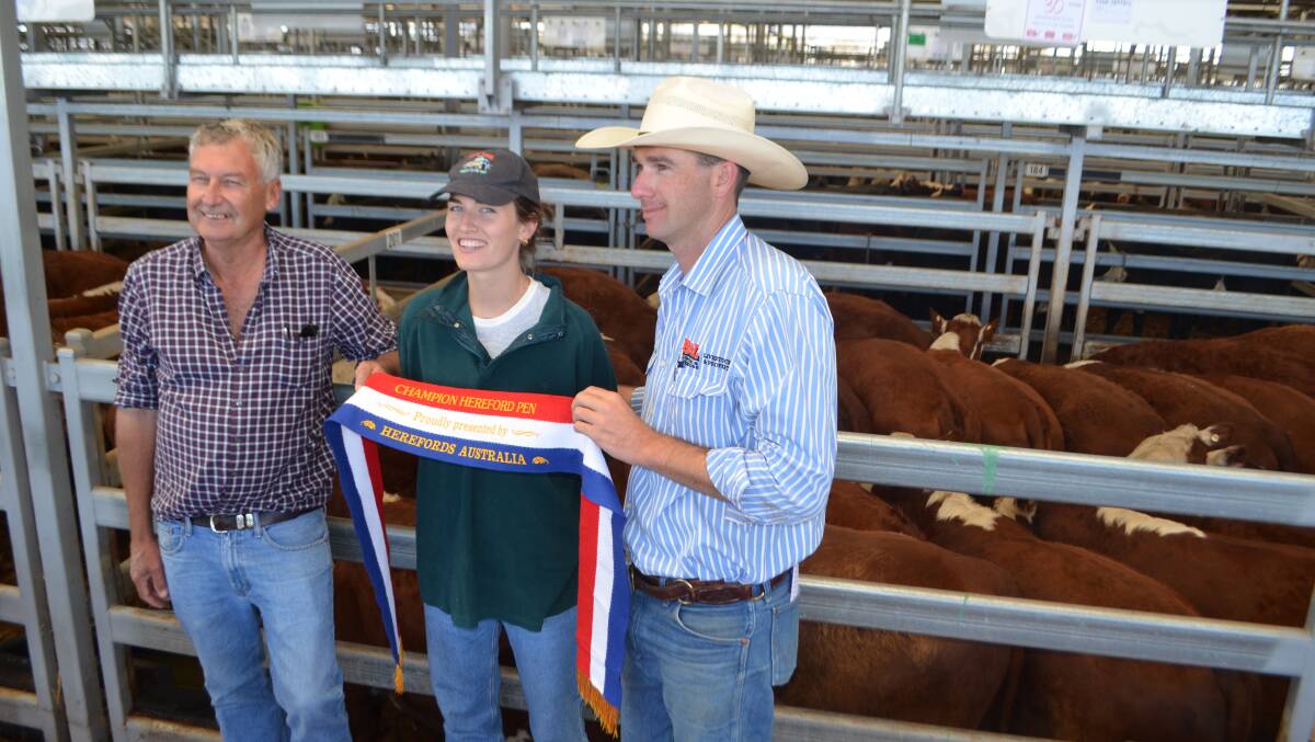 David and Edwina Sleigh, Sleigh Pastoral, Ruffy, Victoria presented with Hereford Society sash for best presented pen of Herefords by judge Todd Clements, Bowyer and Livermore, Bathurst.