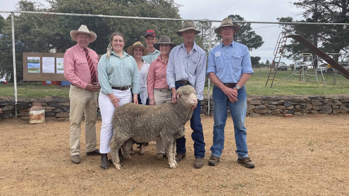 Auctioneer Paul Jameson, Elders Dubbo, Miranda, Ivy, Lachlan, Florance and Alan McGufficke, Greendale, Cooma, with buyer Shaun Beasley, Lindenow South, Victoria,