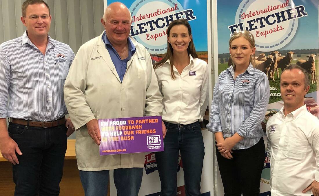 Helping out: Fletcher International Exports team members Graham Lyon, Roger Fletcher and Maddy Herbert, with Foodbank Australia's, Jacqui Payne (centre) and Michael Davidson.