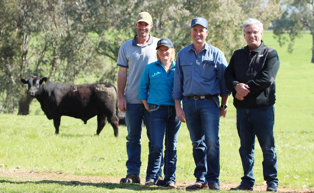 The $32,000 sale-topper with Holston Pastoral Company Victorian buyers Andrew Battersby, Lisa Notley, vendor Corey Ireland, Irelands Angus, and buyer Peter August. Photo supplied. 
