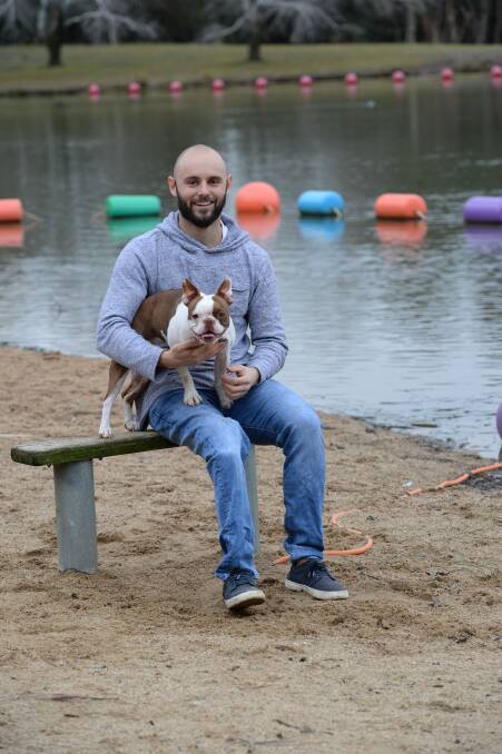 Canberra based Paralympian Scott Reardon, with his dog Milo. Mr Reardon lost his leg in a PTO accident at the age of 12. 