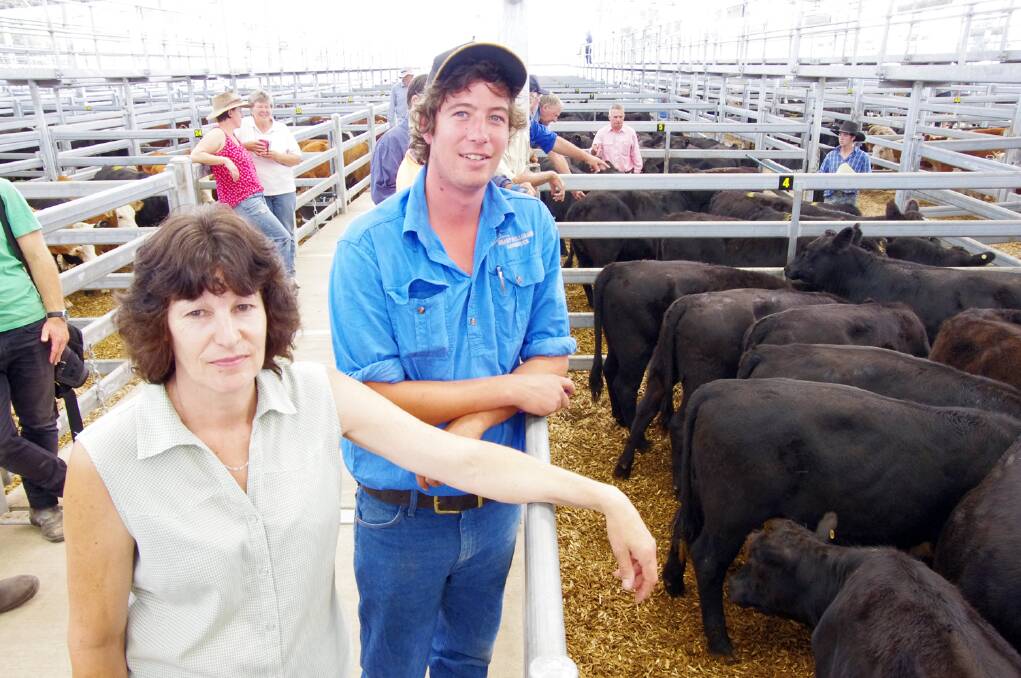 Briagolong's Denise Willox with her pen of 8-10mo Angus heifers, Leawood bloodline, bought by Tom Howden, livestock agent with Sharp Fullgrabe, Bairnsdale.