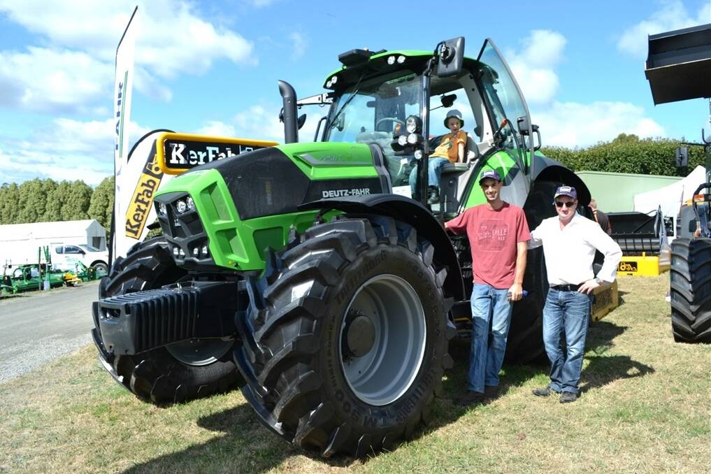 ON SHOW: Adrian Finlay with Chris and Luke Ruff at the 2015 Farm World.