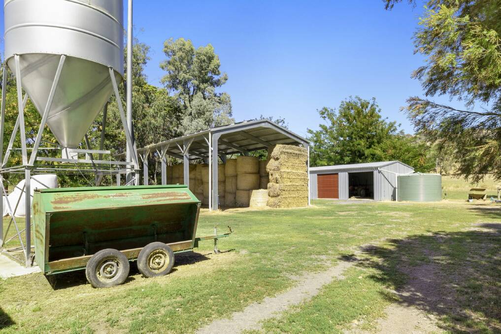 Included in the farm infrastructure at 89 Harrison Road, Warrenbayne, is a complex of buildings including a new steel framed machinery shed, hay storage shed and grain silo.