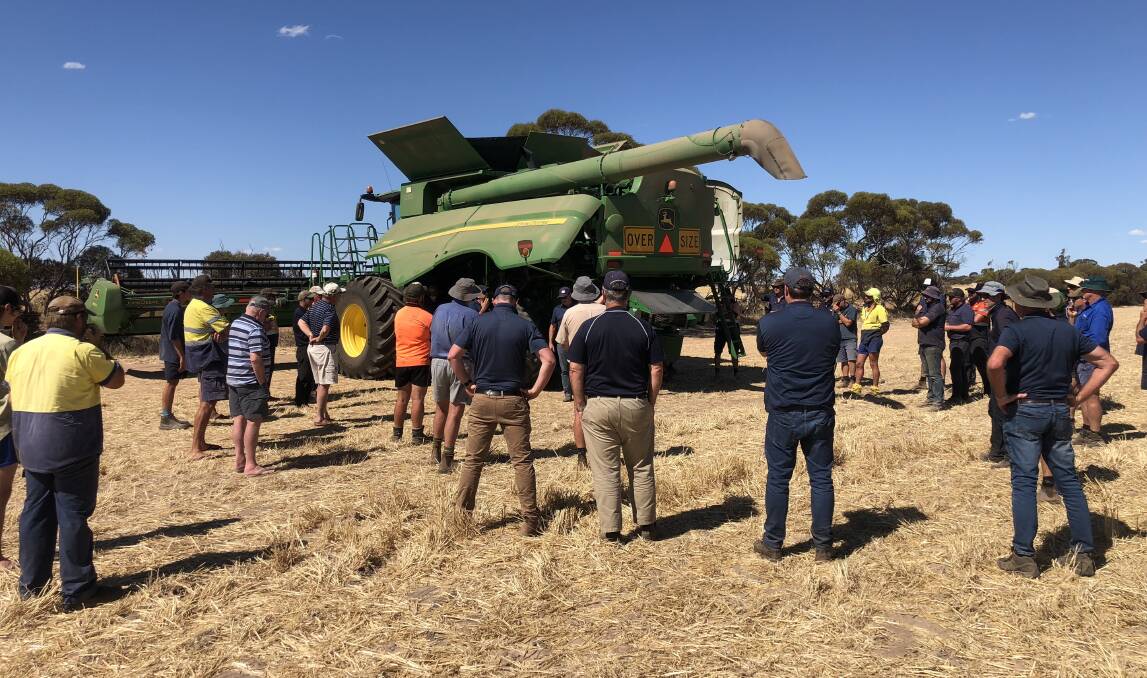 IMPRESSIVE: Growers view a demonstration of the new vertical, mechanical Integrated Harrington Seed Destructor on a property near Carnamah in WA.