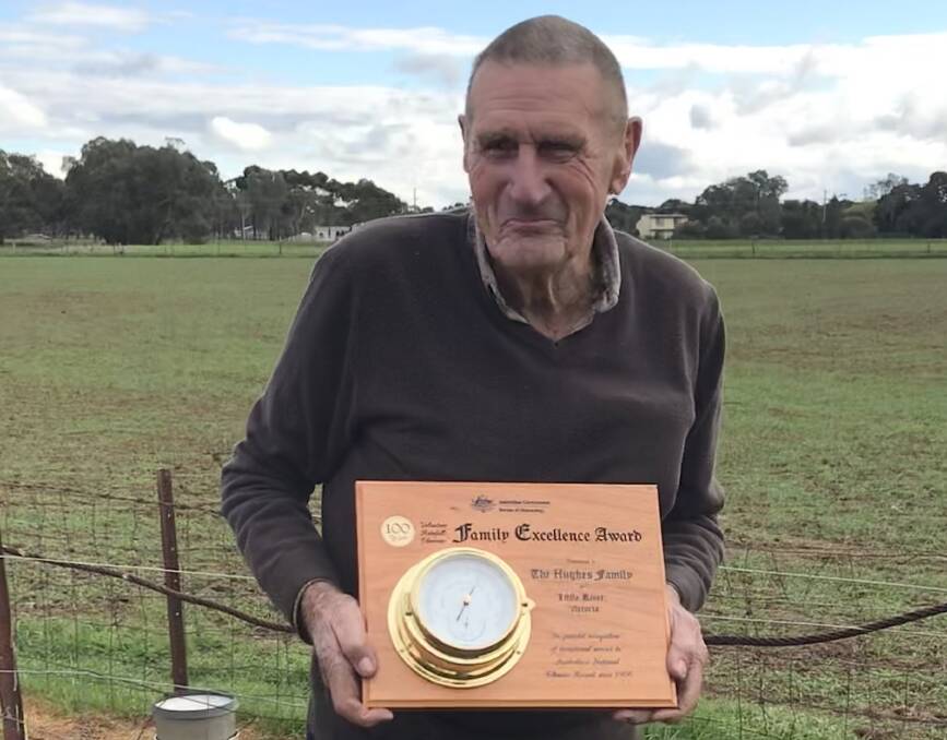 Little River's Bill Hughes receives the Bureau of Meteorology's 100-year Family Rainfall Excellence Award.