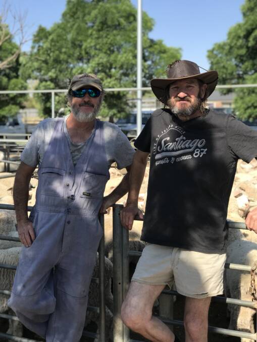 OUT AND ABOUT: Martin Pfeiffer, Ouyen, and Danny Phillips, Patchewollock, at the Ouyen sheep sale recently.