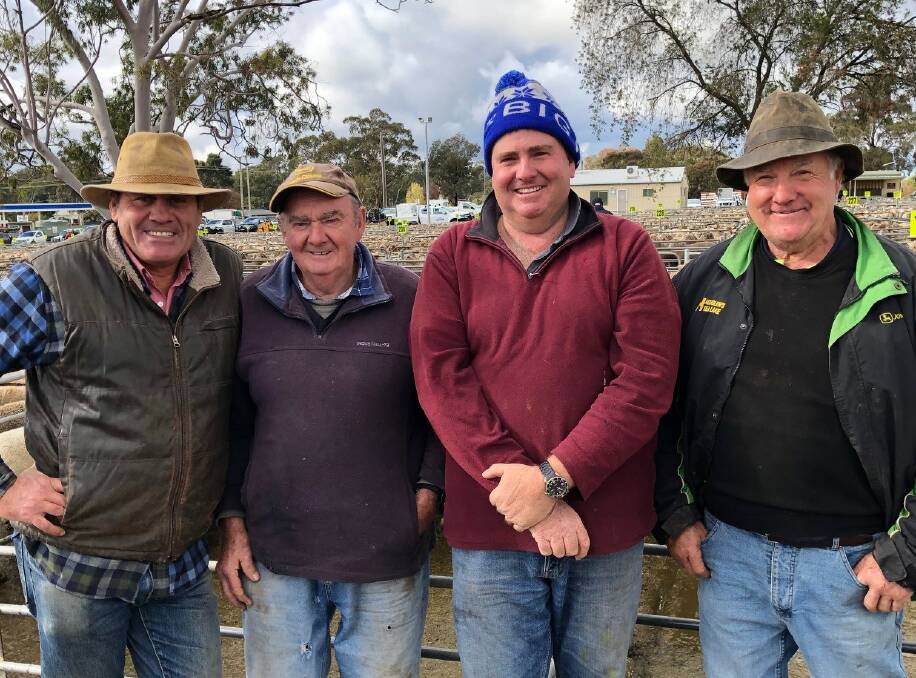 LAMB SELLERS: Steve Grantham, Elders, with Ted and Bruce Plummer, who sold 129 at $228 at Corowa, NSW, and Garry Mickan, Walla Walla, NSW, who sold 163 at $318.