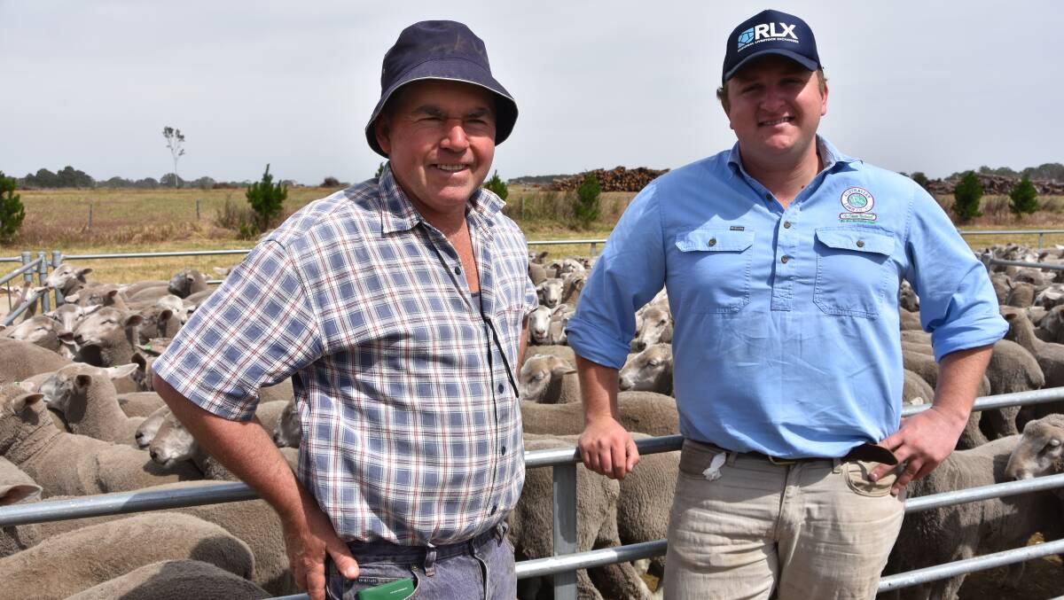 OUT AND ABOUT: Rowan Turner, Berrybank, and agent Angus Lloyd, Australian Lamb Company, Colac, purchased wether lambs at Edenhope last month. Photo by Gregor Heard.
