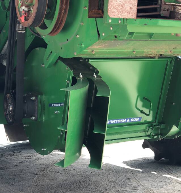 A rear hatch made possible with the new design of the vertical iHSD can be removed and the iHSD bypassed to effectively create a harvest windrow for easily checking grain losses, while a trap door at the bottom also collects any foreign objects coming into the system.