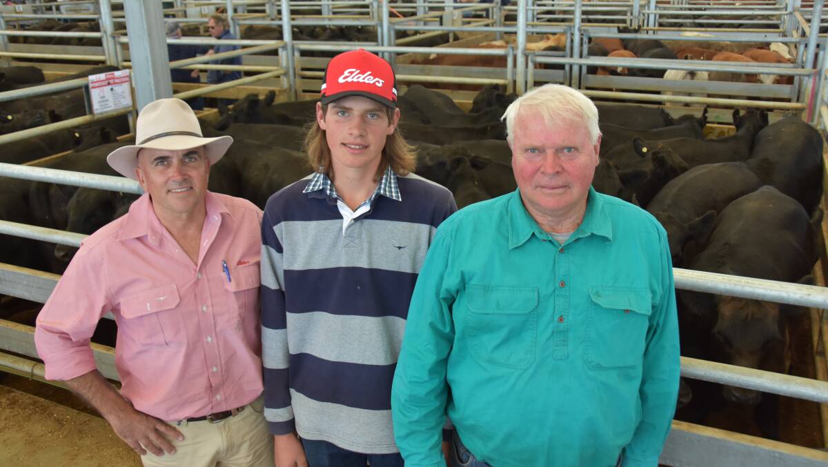 Elders area manager SE of SA Scott Altschwager with clients Ryan and Gary Bowyer, Powerscourt Pastoral, Robe, who sold 80 February drop Angus steers to a $1970 high. Pictures by Catherine Miller.