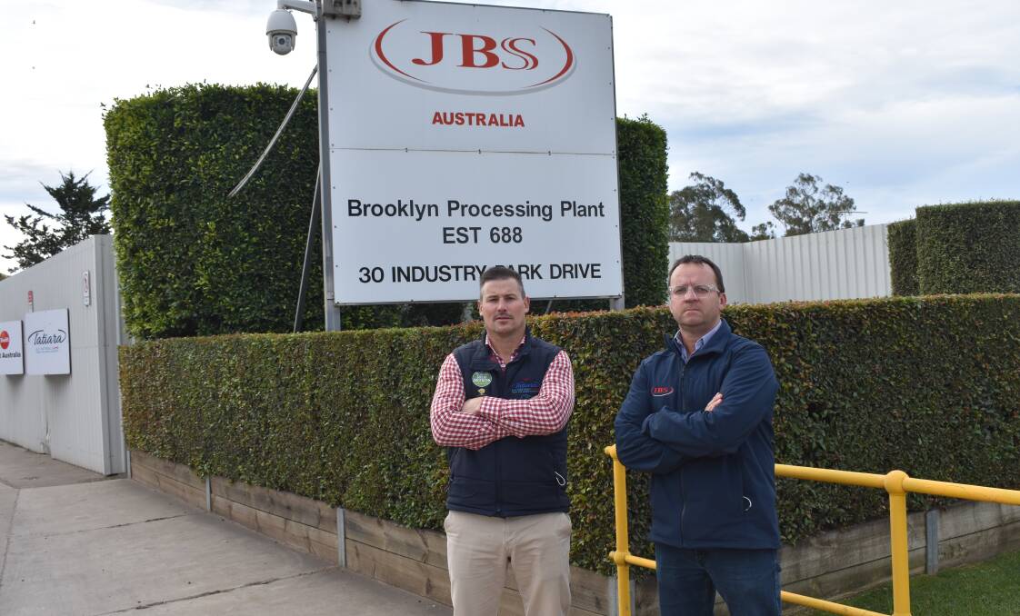 GHOST TOWN: JBS small stock commercial and sales manager Matt Jenkin and southern operations manager Sean Naden in front of the Brooklyn plant in Victoria. Photo by Curtis Baines.
