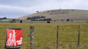 A protest message mown onto a hillside between Ballarat and Daylesford in 2021 is now an historic landmark, according to Google Maps.