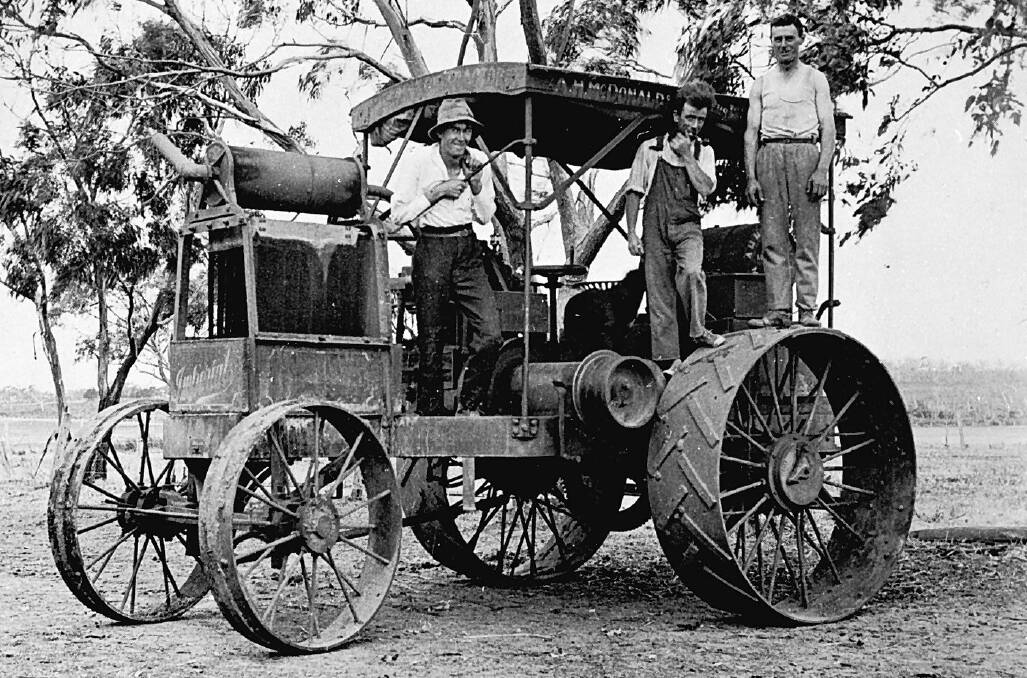 Three men, possibly Bennetts family members, pictured in 1926 on French Island with the revolutionary McDonald tractor. Picture from G. Bennetts