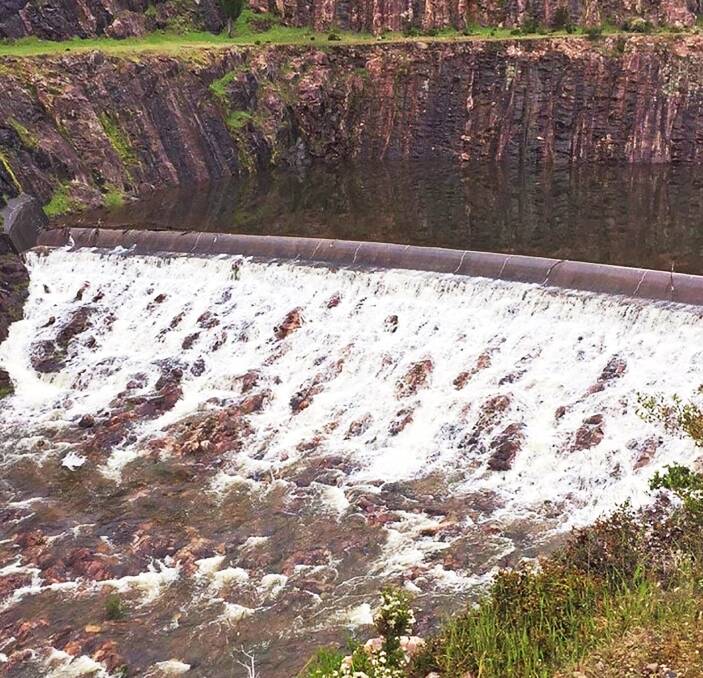 Lake Bellfield, the big Grampians storage which supplies water to thousands across northern Victoria via the Wimmera-Mallee pipeline, is spilling for the first time since 1996. Picture from GMWater.