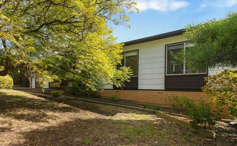 This three-bedroom "retro home" at Victor Harbor is available for $397,500.