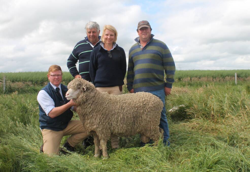 Dale Bruns, AWN holding the ram, purchased by Peter and Annie Tischler with Boorana's Will Lynch.