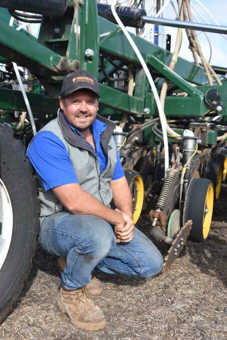 Sam Eastwood with his Excel disc seeder at Kaniva, in Victoria's west, after just completing planting canola on 15cm spacings.