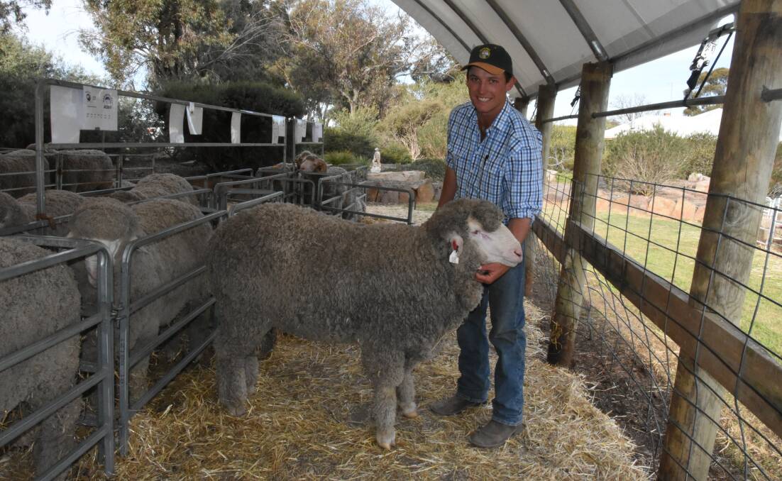 Charlie Brumpton, Jolly Jumbuck Poll Merino  Stud, Mitchell, Queensland, with a ram bought for $8000. Mr Brumpton knows the sheep well, having spent the past three months working at Charinga / Banavie.