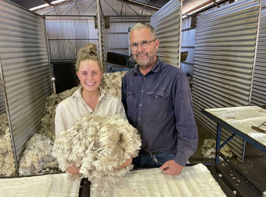 Farming family: Madeline and dad Dirk Stevens shearing lambs at Kulaba, Whiteheads Creek. 