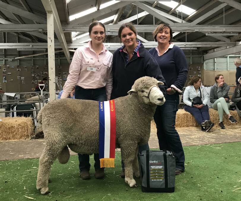 Supreme sire: Supreme Corriedale was awarded to rising two-year-old Monty, exhibited by Black Forrest Corriedale stud co-principals Lily and Poppy Collins, pictured with Emma Collins. 