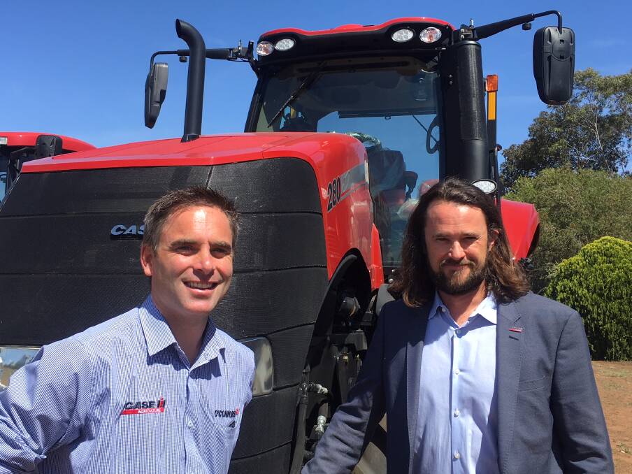 EXPANDING BUSINESS: O'Connors chief executive Gareth Webb and Pete McCann, Case IH. The Victorian-based business has just expanded its footprint into NSW.