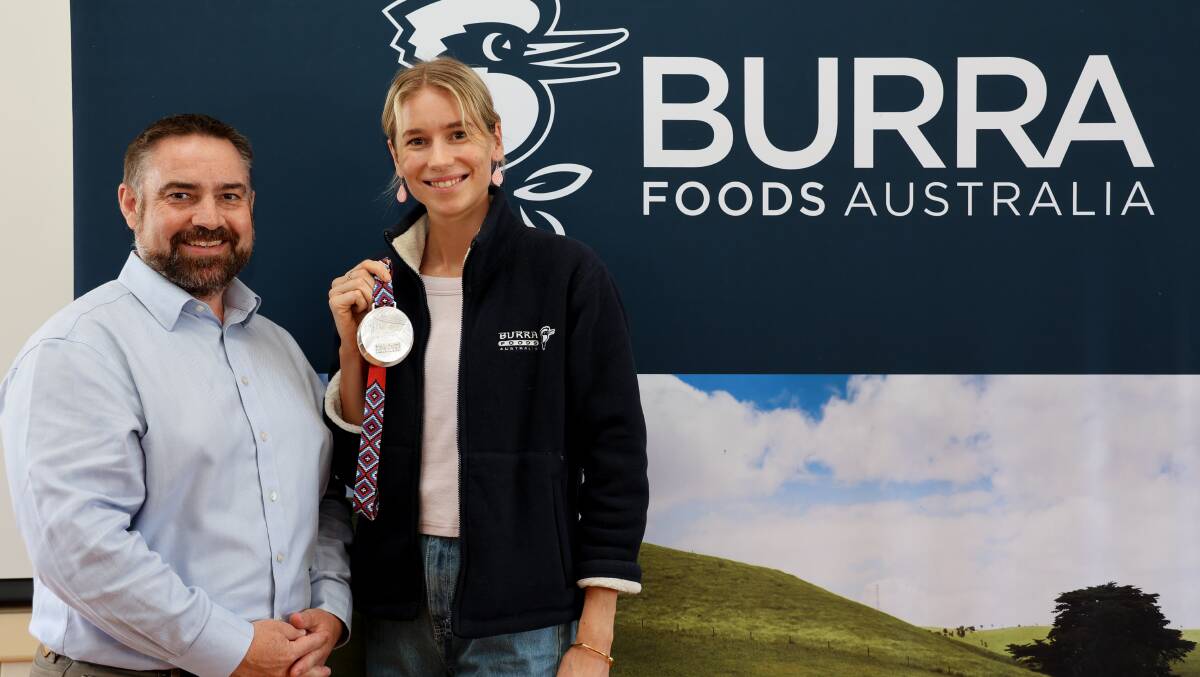 HOME VISIT: Gippsland's golden girl Eleanor Patterson with Burra Foods chief executive Stewart Carson.