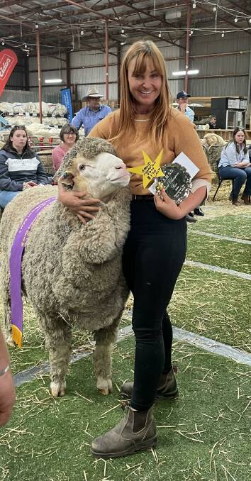 Claire McGauchie, Terrick West, Prairie, with the winning ram. Picture supplied