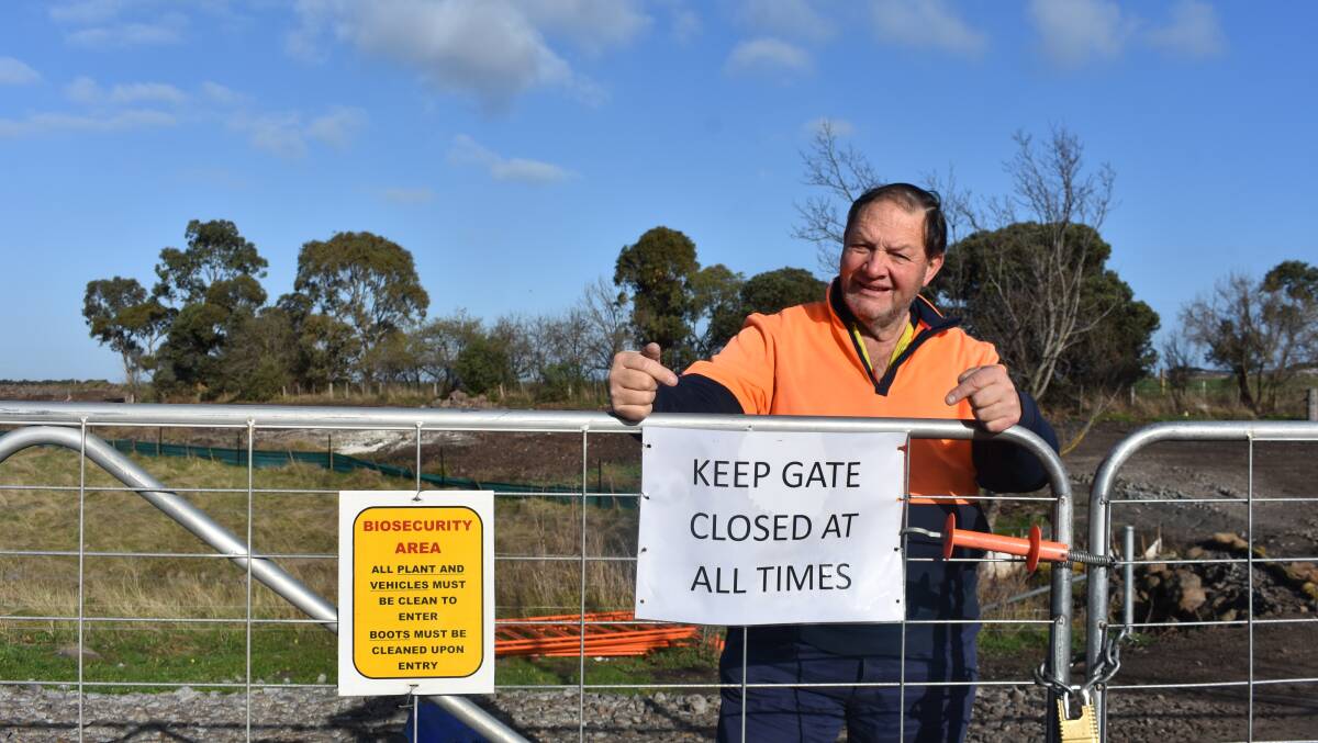 Bulla livestock and crop producer Alan McKenzie has resorted to hand-made signs to safeguard biosecurity on his property. Picture by Andrew Miller