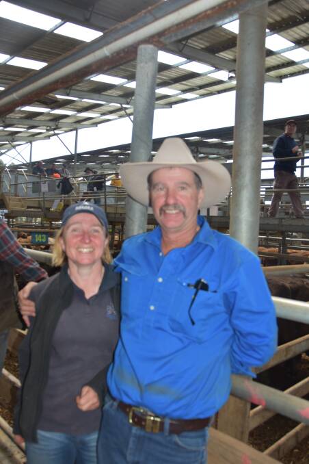 HAPPY SELLERS: Amanda Wilkins, Mirboo North, brought a draft of Murray Grey and Murray Grey Angus steers and heifers to Leongatha, and caught up with Ian Hengstberger, Dumbalk North, who offered Angus steers.
