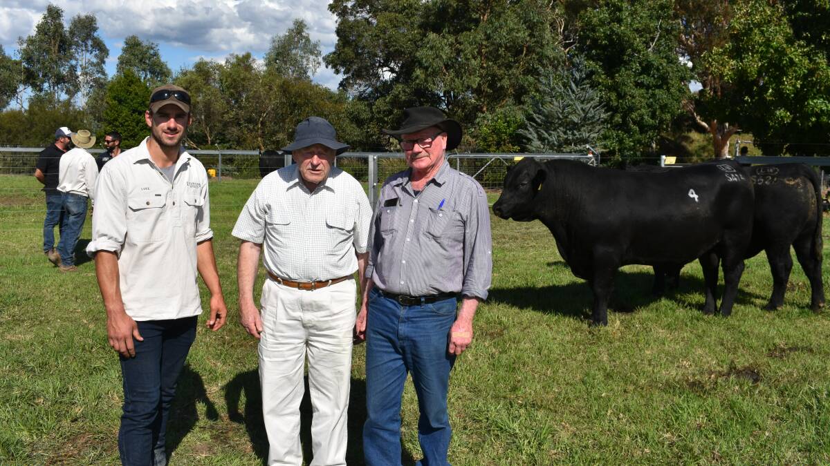 Stud co-principal Luke Stuckey, with the buyer of the top bull Kevin Opray, Hedley, (right) and friend Keith Haycroft, Port Welshpool. Picture by Andrew Miller