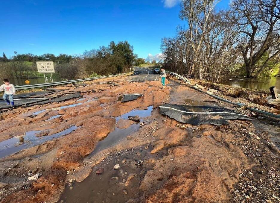 Flood damage caused to the Heathcote to Bendigo road, just near Axedale. Photo supplied by federal Bendigo MP Lisa Chesters, through Facebook.