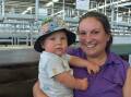 Nikki Hurn, with 10-month old Dylan, Creswick was "just looking" and checking prices and quality.  "I'm always looking to see what's about," she says. She has a small number of cattle to go into the next prime sale.