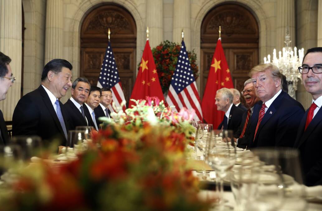 TRADE WAR: U.S. President Donald Trump, second right, and China's President Xi Jinping, second left, attend their bilateral meeting at the G20 Summit in Buenos Aires, Argentina late last year. 