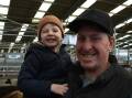 JUST LOOKING: Justin Taylor, and son Harry, four, Dalyston, were at Leongatha to check out the prices.