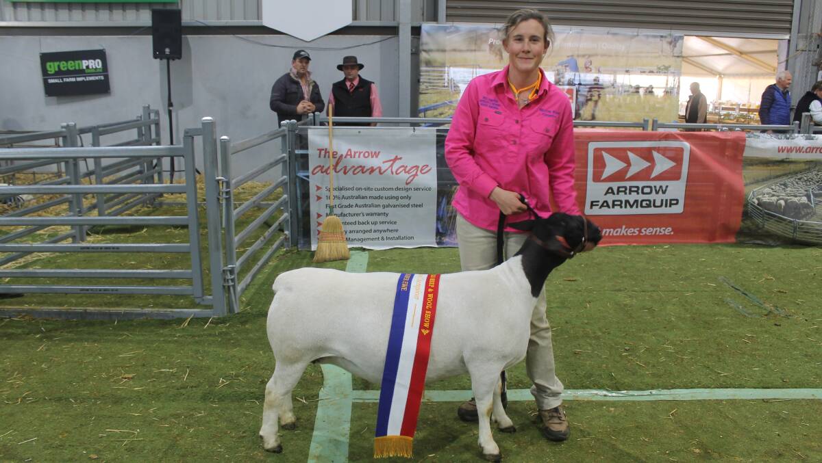 DORPER CHAMPION: Dell Dorpers Andrea van Niekerk with the Supreme Champion ewe, Stretchy. Picture: Andrew Miller.