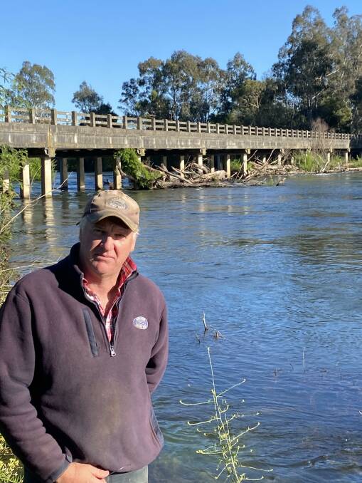 Goulburn River Trout, Alexandra, director Ed Meggitt on the Goulburn River at Gilmore's Bridge, showing debris built up after this month's latest flood. Picture supplied by Ed Meggitt