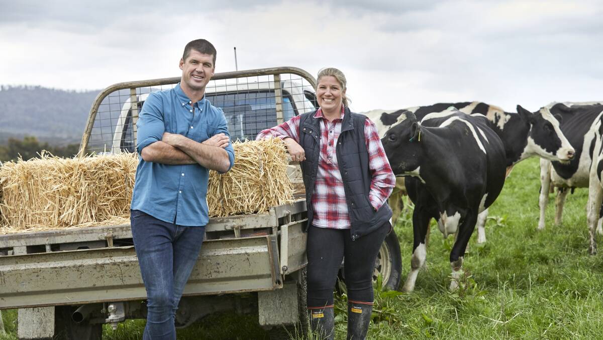 BRAND AMBASSADOR: Medai personality and former AFL star Jonathan Brown with Gippsland dairy farmer Trish Hammond, who features in the campaign. 