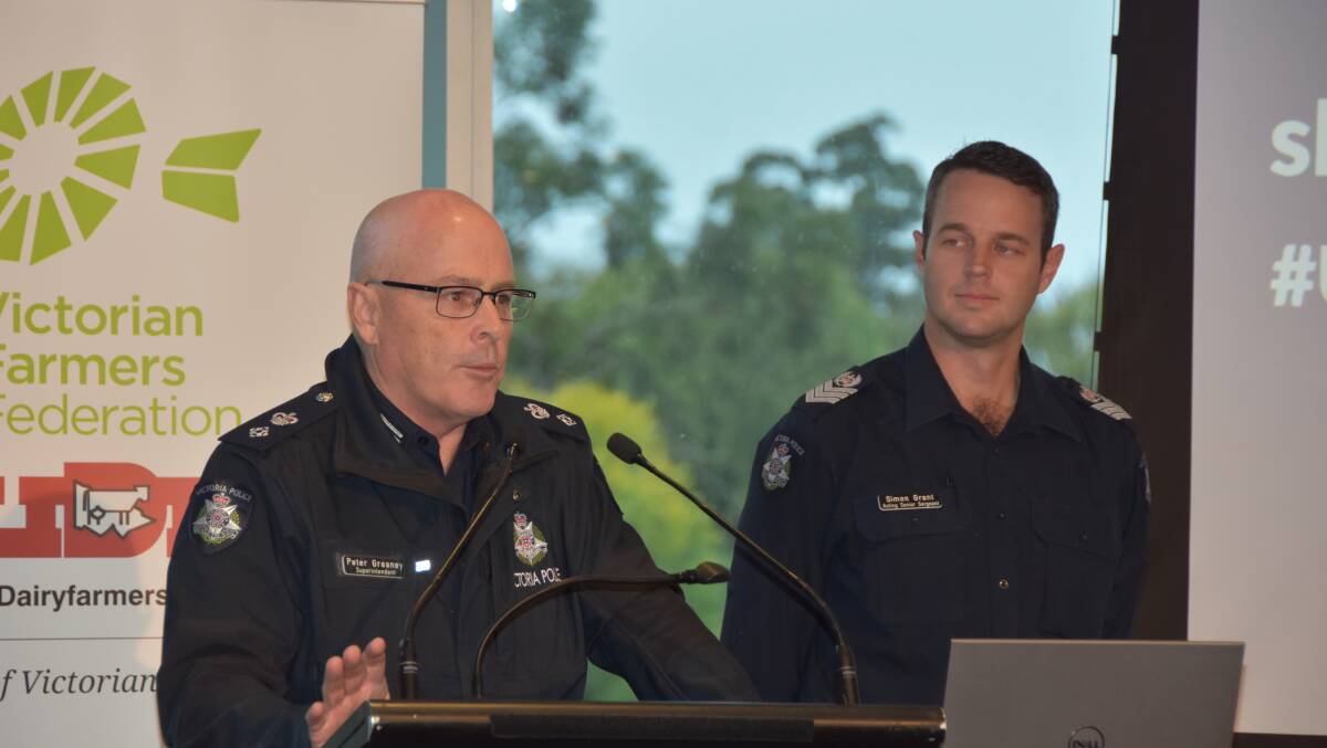 NEW GROUP: Victoria Police Superintendent Peter Greaney and Horsham Agricultural Liaison Officer Senior Sergeant Simon Grant address the United Dairyfarmers conference, Melbourne.