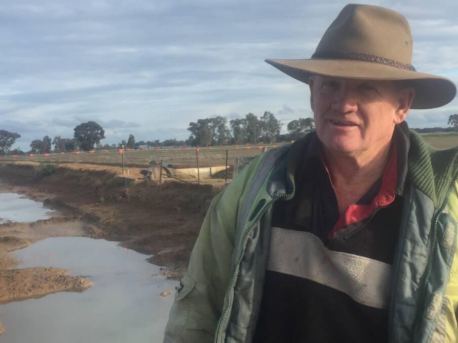 CHANNEL DESILTING: Stephen Snelson, Koyuga Irrigators' Group chairman, near a recently desilted channel, on his property.