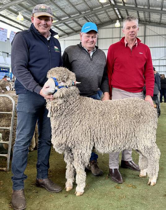 Stud Park South stud co-principal Pat Millear, Willaura, buyer Tom Bibby, Tatyoon, and Elders agent Craig Potter with the joint top-priced ram. Picture supplied