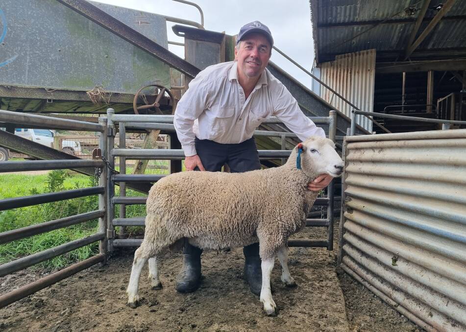 Cashmore Oaklea stud co-principal John Keiller with the sale-topper, a maternal ram that made $11,200. Picture supplied