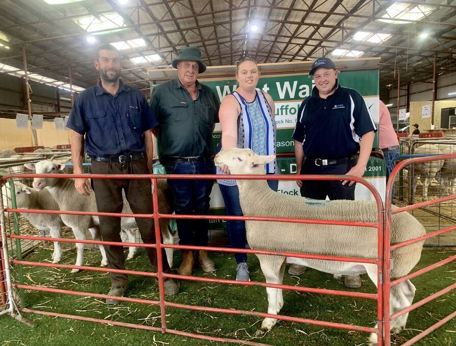 GOOD SALE: Jason Ellis, West Wail, the buyer of the top priced ram Ian Klowss and Ellie Perryma and AWN Horsham livestock agent, Benn Molineaux.

