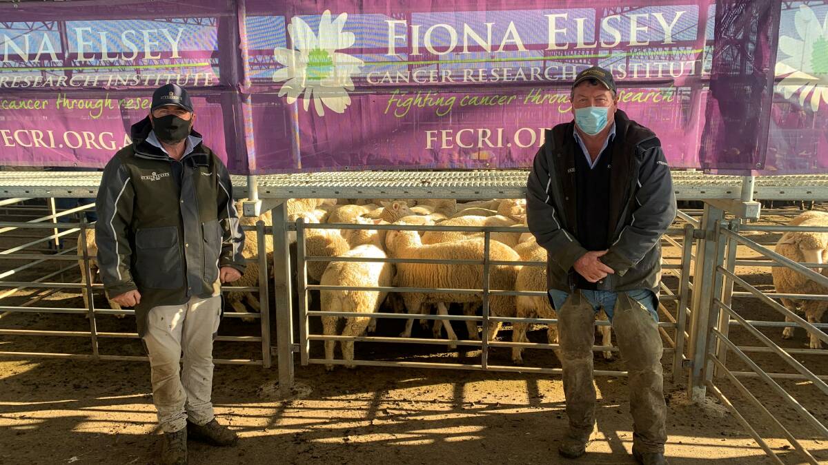 SUCCESSFUL AUCTION: HF Richardson stock agent Bernie Nevins and auctioneer Peter Palling at the sale, which made $8000 for cancer research.