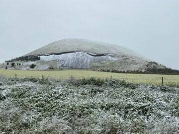 Mount Elephant, Derrinallum, dusted with a coating of snow.
