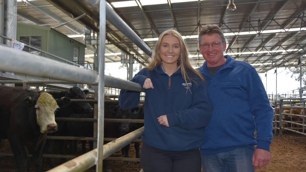 HAPPY SELLERS: Greg and Darcey Heffernan, Beveridge, were happy with the sale of 11 Black Simmental cross steers, averaging 344 kilograms, for $1050. 
