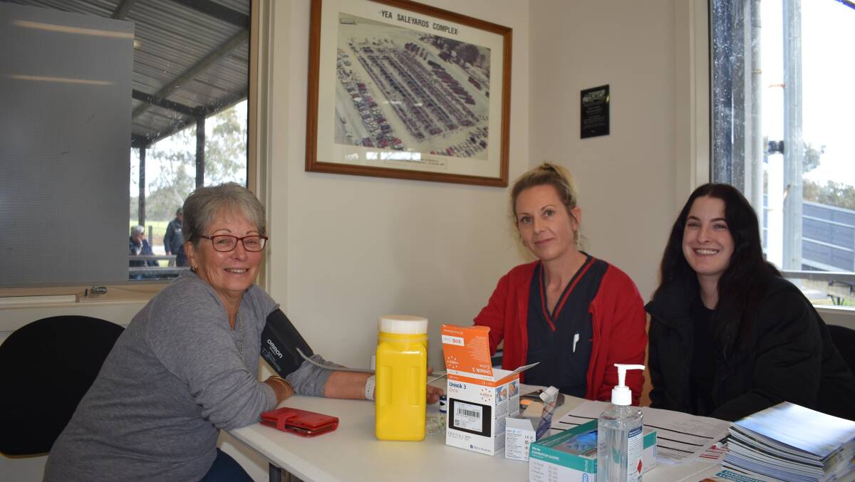 Glenburn farmer Lorna Morrell was among the first to take part in the free health screening checks, run by Yea and District Memorial Hospital cardiac health nurse Shona Miljkovic and health promotion officer Hailey Docking, Boronia. Picture by Andrew Miller.